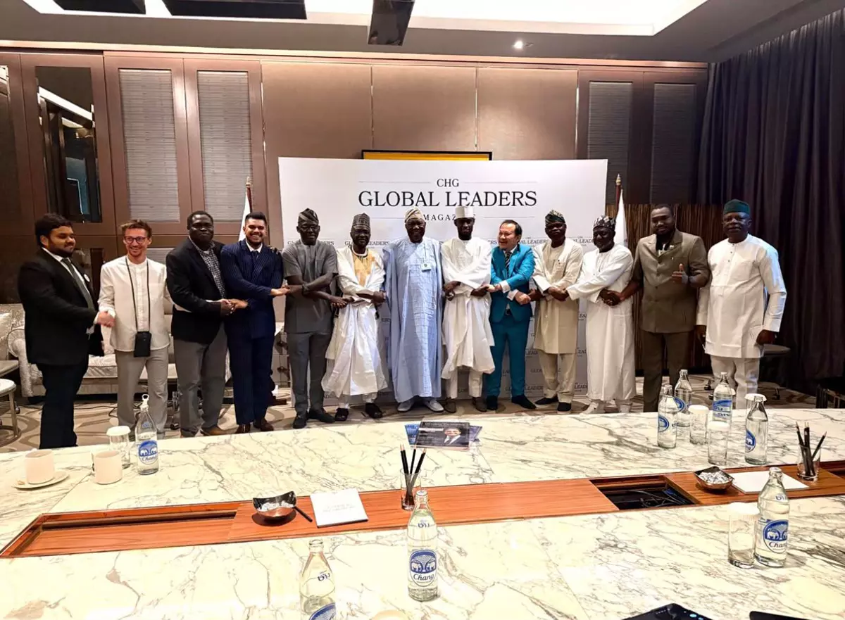 Group of leaders standing together at a CHG Global Leaders Magazine event